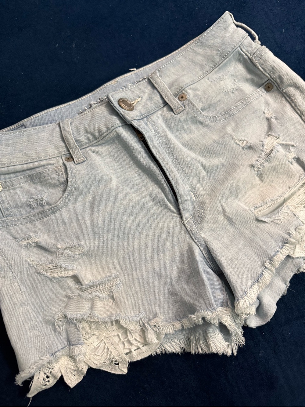 Light Distressed Women's Denim Shorts with crochet detail American Eagle size 8